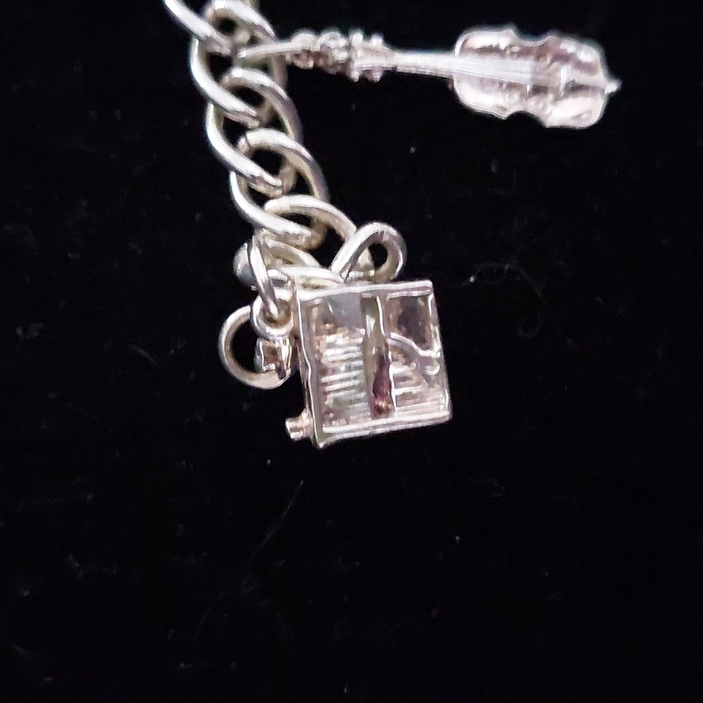 Sterling silver charm bracelet with music theme. - Picture 5 of 5